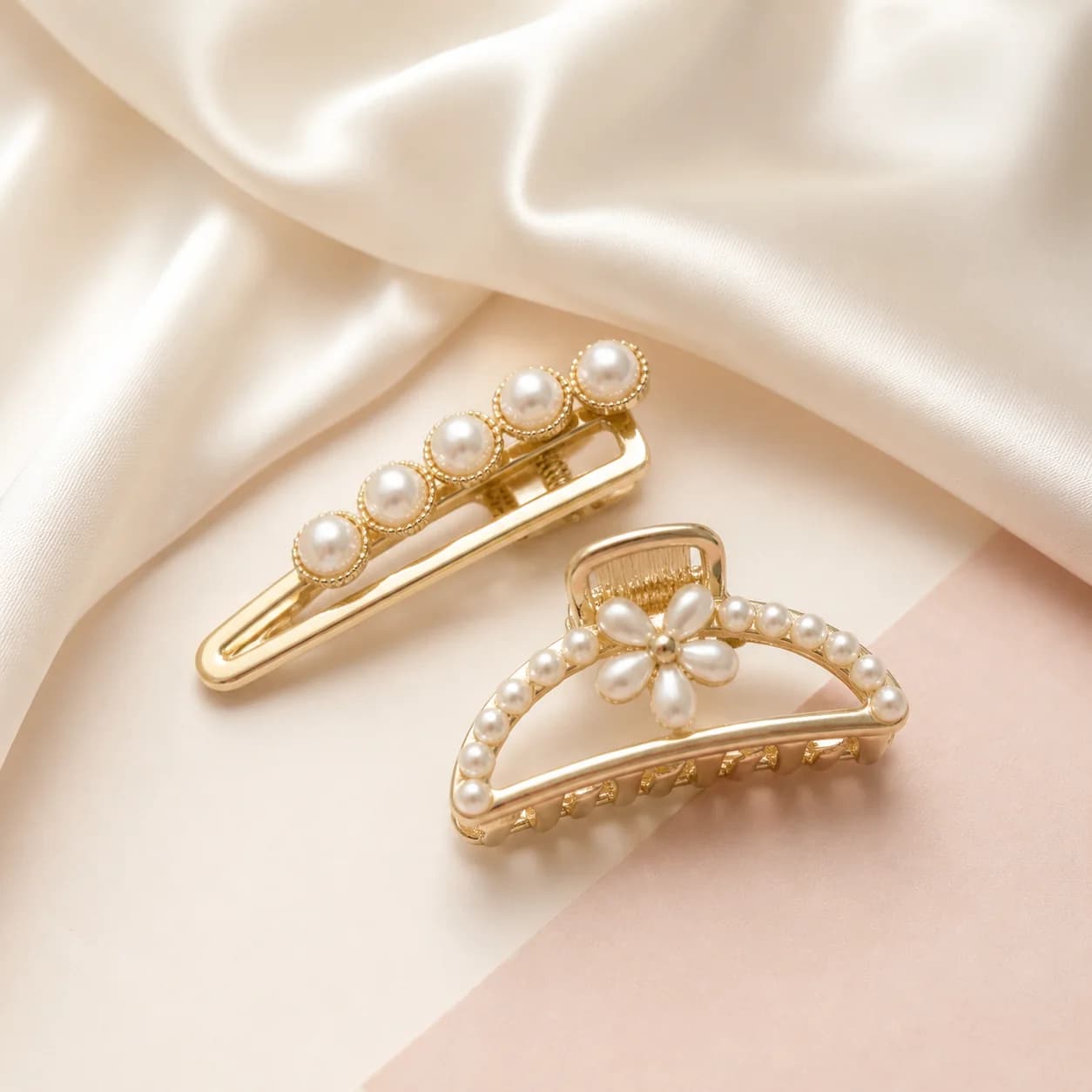 Pearl hair clips on ivory fabric